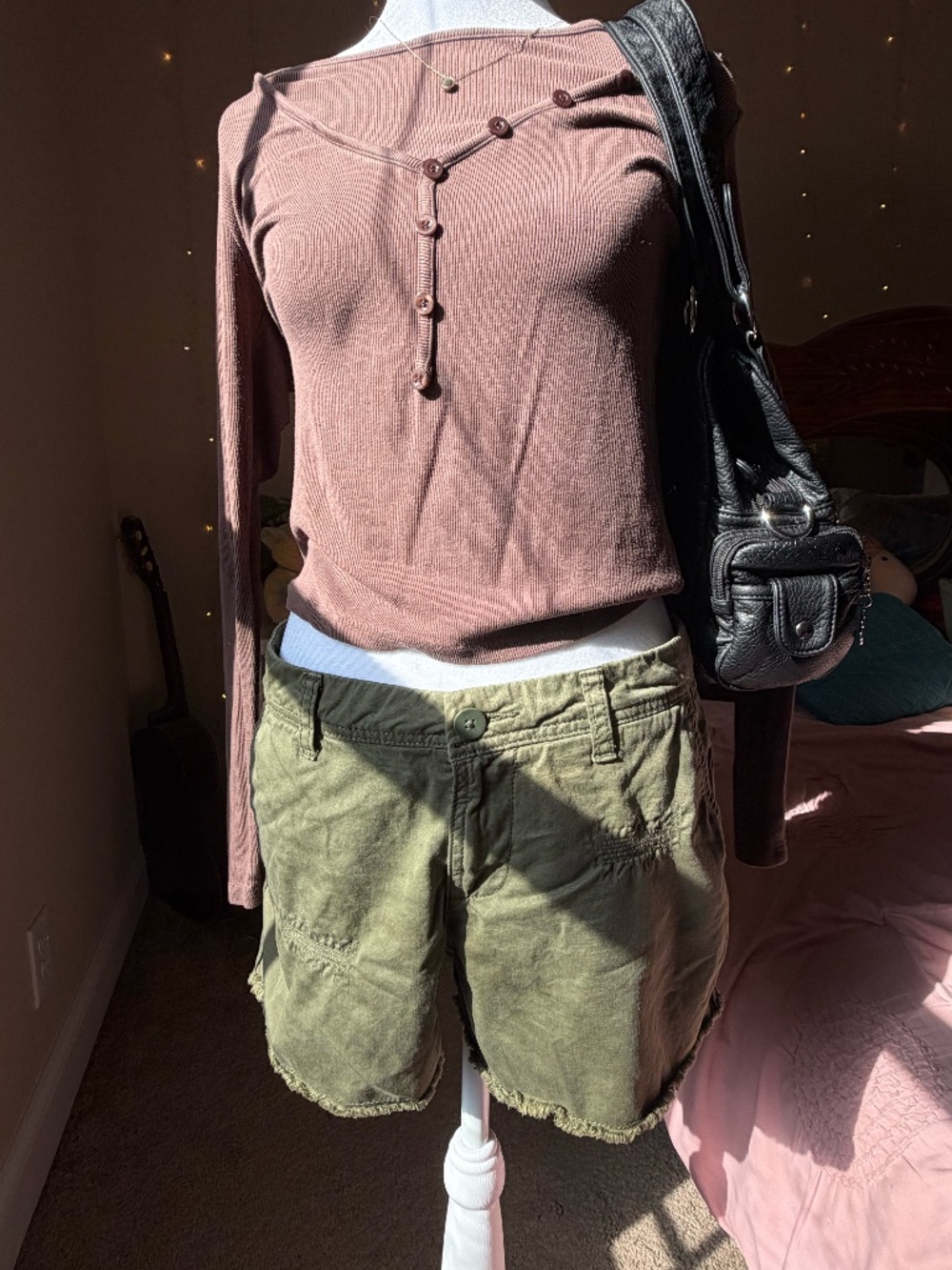 Earthy green shorts with a frayed hem